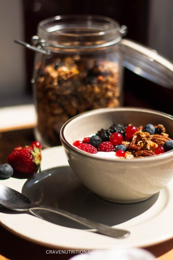 granola with blueberries and raspberries