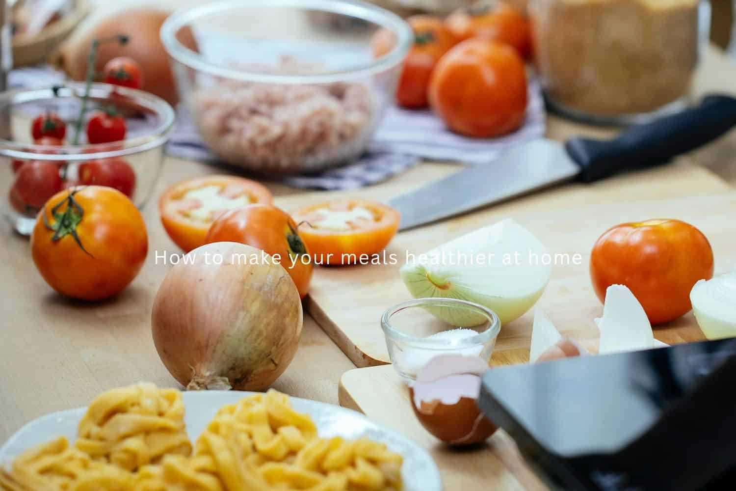 wooden cutting board with cut and chopped vegetables spread out and arranged around the cutting board with chopping knife during meal prepping healthier