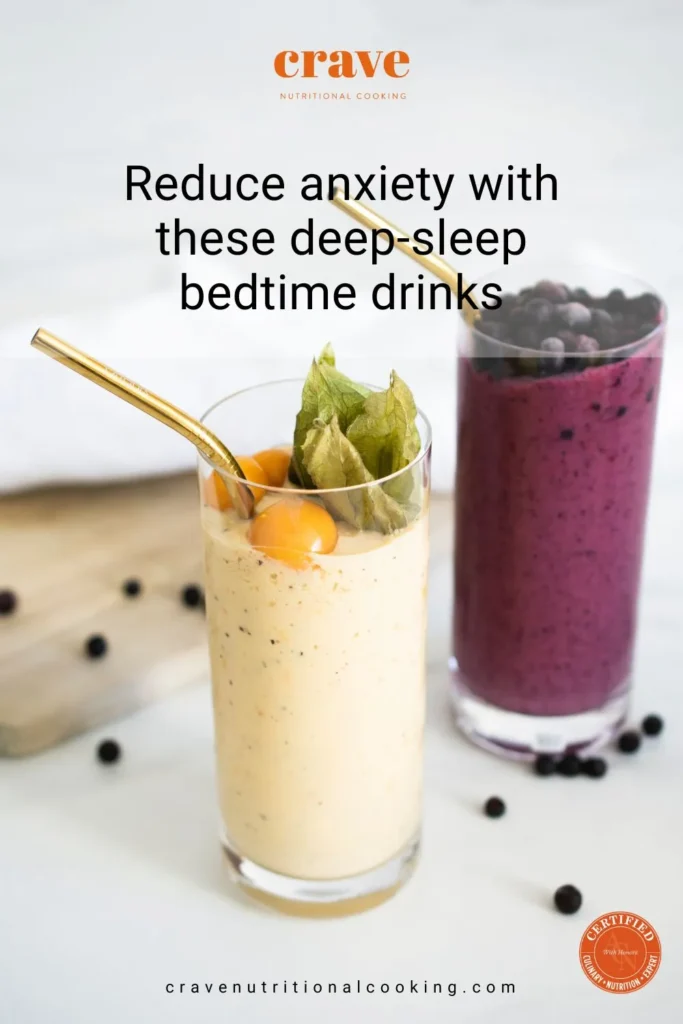 2 tall highball glasses filled with nutritious milkshake smoothie type of drink that contains soothing relaxing sleep inducing banana and fruit juice that reduces anxiety